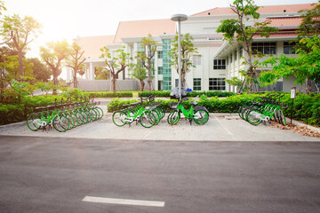 App bicycles for city bike-sharing, parking in a public area. concept of eco-friendly healthy...