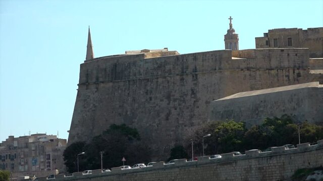 Walls of Malta seeing from the boat.