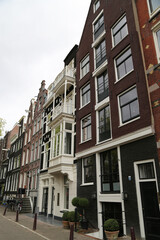 Fototapeta na wymiar The characteristic buildings of the city of Amsterdam