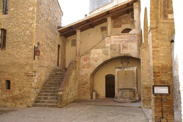 View of piazza del Comune (square of the Communal Palace) in San Gimignano, Tuscany (Italy)