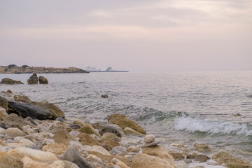 Magical sunset background natural colours crashing wave Cyprus landscape beach sea stone . High quality photo