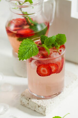 Summer drink refreshing strawberry lemonade with mint