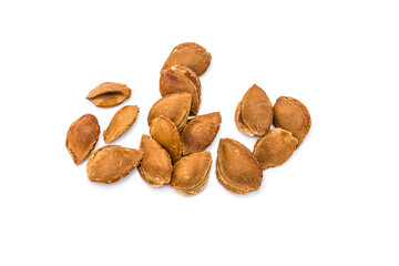 Apricot pits isolated on white background