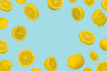 Floating levitating fresh lemon on pastel blue background. Vitamins, healthy diet concept.