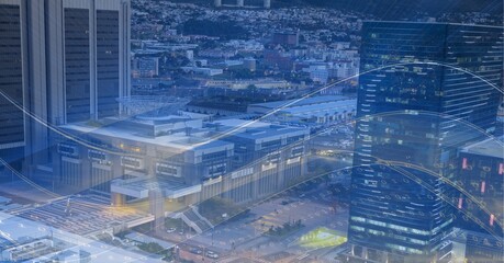 Composition of digital light trails over cityscape