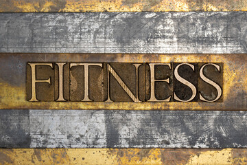 Fitness text on vintage textured grunge copper and gold steampunk background