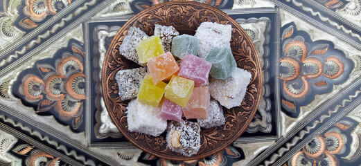 Traditional Turkish Delight, Turkish Sweet Sugar Ramadan (Ramadan) Dishes. Presentation on an antique plate.