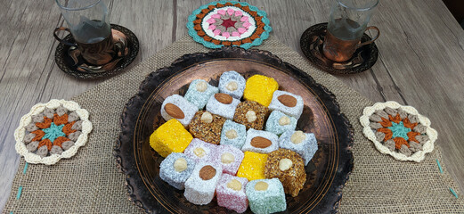 Traditional Turkish Delight, Turkish Sweet Sugar Ramadan (Ramadan) Dishes. Presentation on an antique plate.