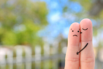 Fingers art of couple. Concept of woman doesn't like the man who loves her.
