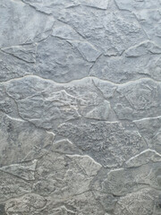 Textured gray stone pattern for wall, floor, wall to decorate the building. Residence.