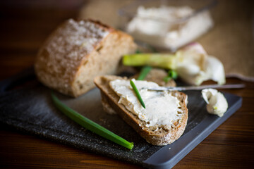 Homemade buckwheat bread with garlic cheese spread