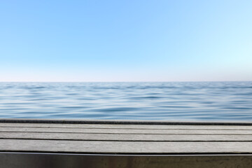 Gray wooden desk and summer sea landscape 