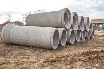 Reinforced concrete pipes at a construction site.