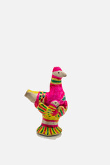 Fototapeta na wymiar multicolored clay figurine of a chicken