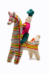 clay figure of a villager on a horse