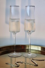 glasses of champagne and gold plate