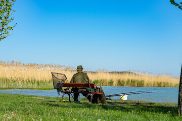 active old fischerman with a bench at lake Balaton