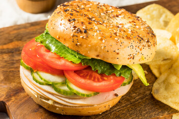 Homemade Bagel Turkey Sandwich with Lettuce