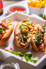 Hot dogs with different mexican toppings, close up