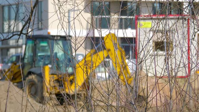 Excavator on the construction site in 4K Slow motion 60fps