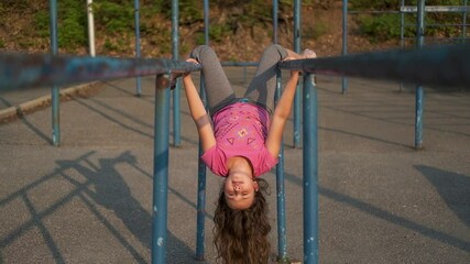 Cute caucasian little happy girl on playground