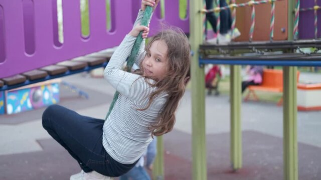 4k. Cute caucasian little happy girl on playground