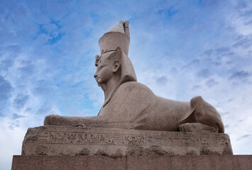 Ancient Egyptian sphinx on Universitetskaya embankment of Neva river in front of Imperial Academy of Arts, Saint Petersburg, Russia