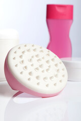 Pink massaging tool, which eliminate cellulite.