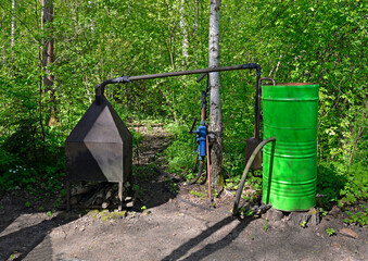 General view of self-made equipment for the preparation of various distillates. They are commonly made in Podlasie in Poland. The exhibition can be seen in the Podlasie village museum.