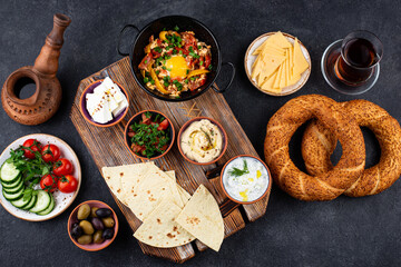Traditional Turkish breakfast with meze and simit
