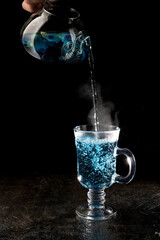 Organic blue tea Anchan, Clitoria, Butterfly Pea on black background