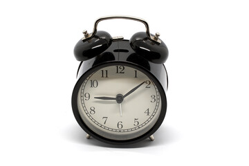 Black alarm clock isolated on white background.