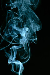 Fototapeta premium Multicolor Smoke painting on Black Background. Abstract.