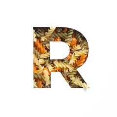 Letter R of English alphabet made of fusilli pasta and white cut paper. Typeface for grocery...
