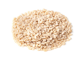 handful of raw split black gram beans on white