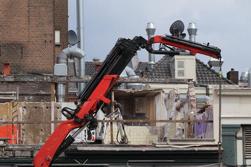 Naklejka premium Amsterdam Leidseplein Demolition Works with Demolishing Equipment