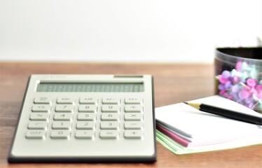 calculator, simple box and scrapbooks