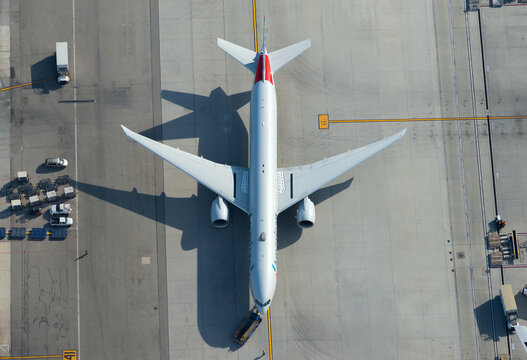 American Airlines Boeing 777 being towed at Los Angeles International Airport. Aerial view of 777-300 aircraft registered as N726AN.