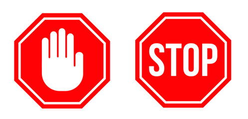 STOP signs in flat design. Vector illustration. Red stop signs isolated on white background