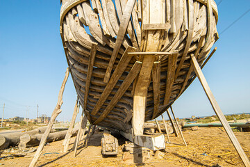 unfinished basic construction of wooden fishing ships.