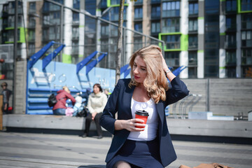 Fototapeta premium Business woman with a cup of coffee
