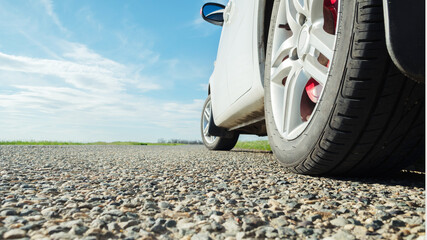 car on the road wheels asphalt grip reliability travel