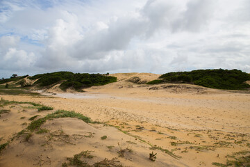 sand dunes and clouds