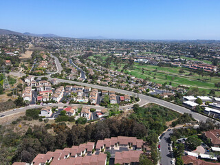 Aerial view of houses and condos with golf in Carlsbad, North County San Diego, California, USA.