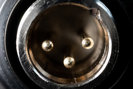 Macro Closeup of Worn Out XLR Input Pins on Condenser Microphone