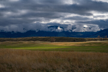 2021-05-09 OPEN SPACES WITH SUN STREAKS AND CLOUDY SKIES IN MONTANA 
