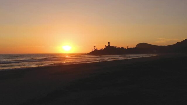 Beautiful pink sunset at Cerritos beach in Baja California Sur