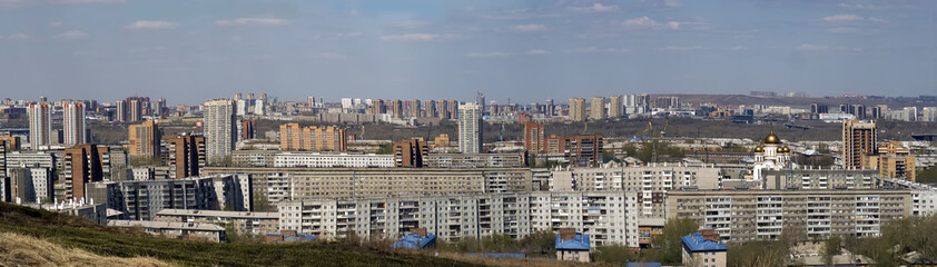 Fototapeta na wymiar City landscape. City skyline. Big city. View from the hill. Panorama