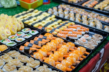 Fast food, desserts and various foods sold at the bazaar in the North of Thailand.