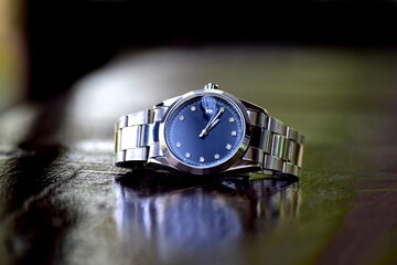 luxury watch with green dial It is a wrist watch for business people.